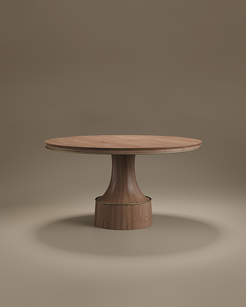A round Buck Dining Table by Porus Studio featuring a rich walnut wood top and a sculptural pedestal base, accented with aged brushed brass details, set against a neutral studio background.