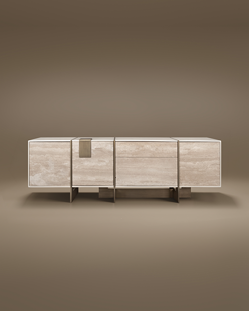 Front view of the Coloma Sideboard featuring light beige Travertine stone panels, stainless steel metal accents, and a white leather textured top set aginst a beige background.