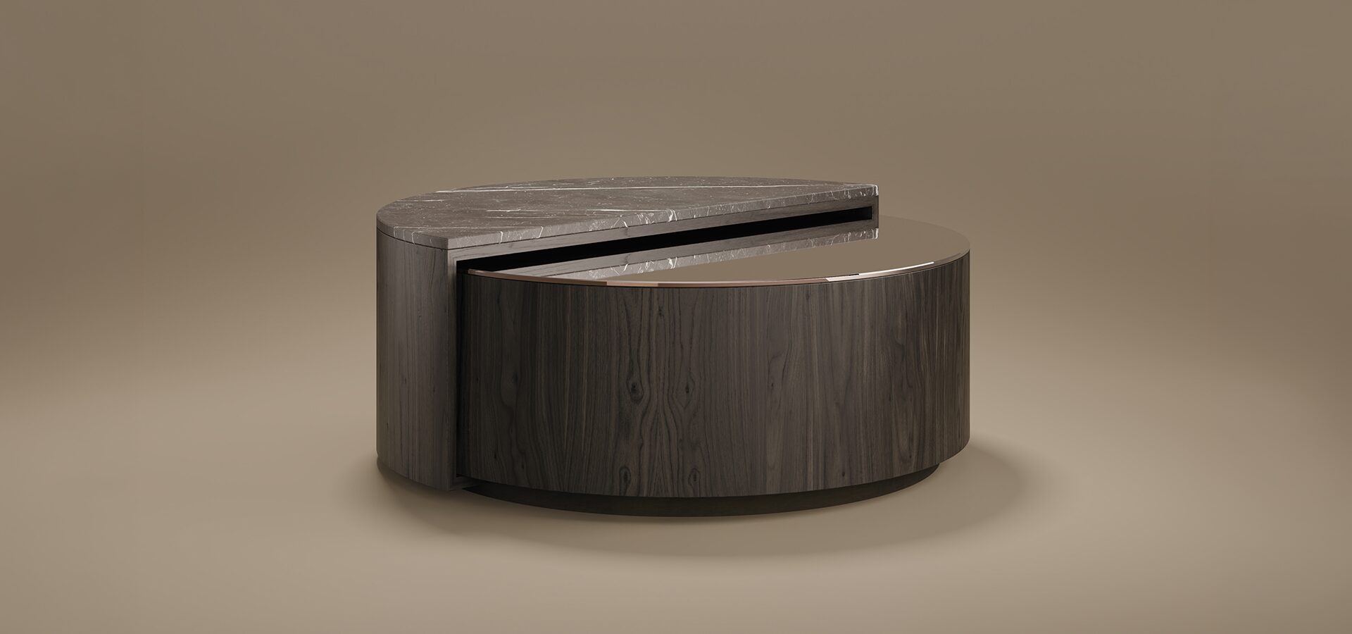 A sleek, circular Westinghouse Center Table by Porus Studio, featuring a tiered, split-level design. The top semi-circle is made of grey Kenzo marble with white veining, while the lower, slightly offset tier features a smoked mirror surface. The cylindrical body is crafted from dark-stained ash wood with a visible grain, separated by a thin brushed brass accent. The table is set against a minimalist, warm taupe background with soft studio lighting.