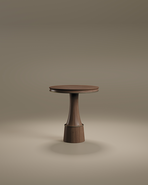 The Buck II Dining Table by Porus Studio, showcasing a compact circular walnut wood surface and a slender, elegant pedestal base with aged brushed brass trim.