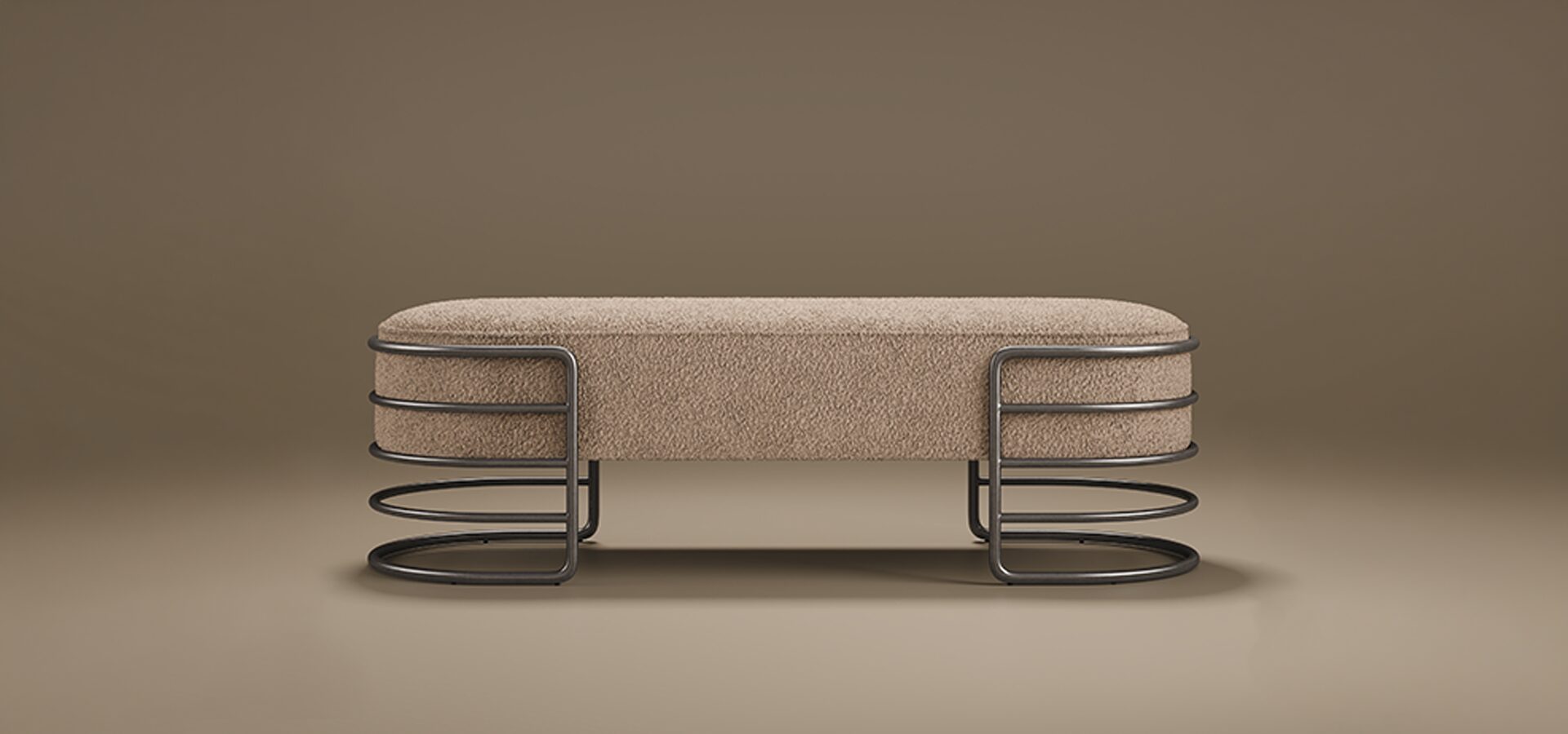 Front view of the Eero Bench by Porus Studio, featuring a long oval seat upholstered in beige bouclé fabric supported by a sculptural dark metal base with concentric tiered rings.