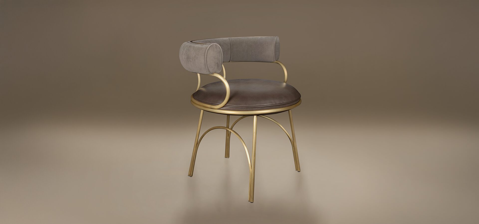 Austin Dining Chair featuring a round brown leather seat, a curved grey velvet backrest, and a gold-finished steel frame with arched legs.