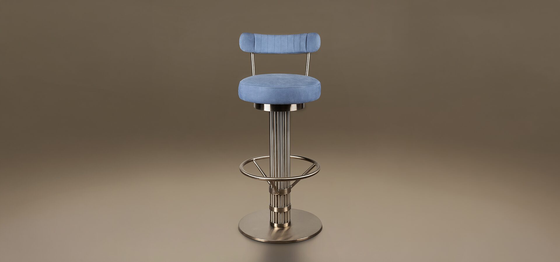 A luxury Willis Bar Chair featuring a cylindrical fluted base in Stainless Steel and a circular footrest. The seat and slender ribbed backrest are upholstered in Leather. Set against a neutral taupe background.
