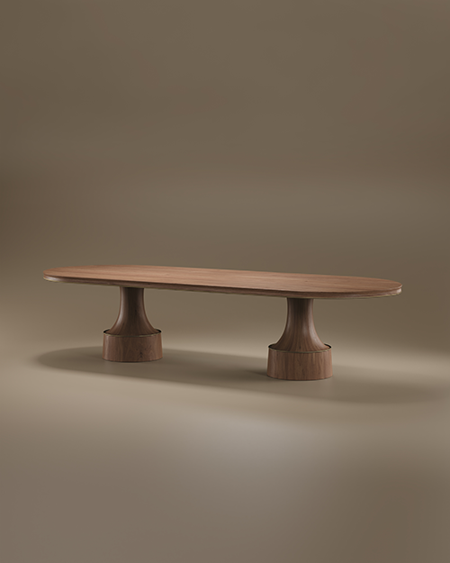 A large Buck Oval Dining Table by Porus Studio crafted from walnut wood, featuring an expansive oval top supported by two signature sculptural pedestal legs with aged brushed brass frames.