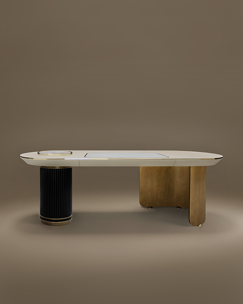 The Arizona Desk by Porus Studio, featuring an asymmetrical design with a cream lacquered wood top, one fluted black leg, and one curved brass leg against a neutral background.