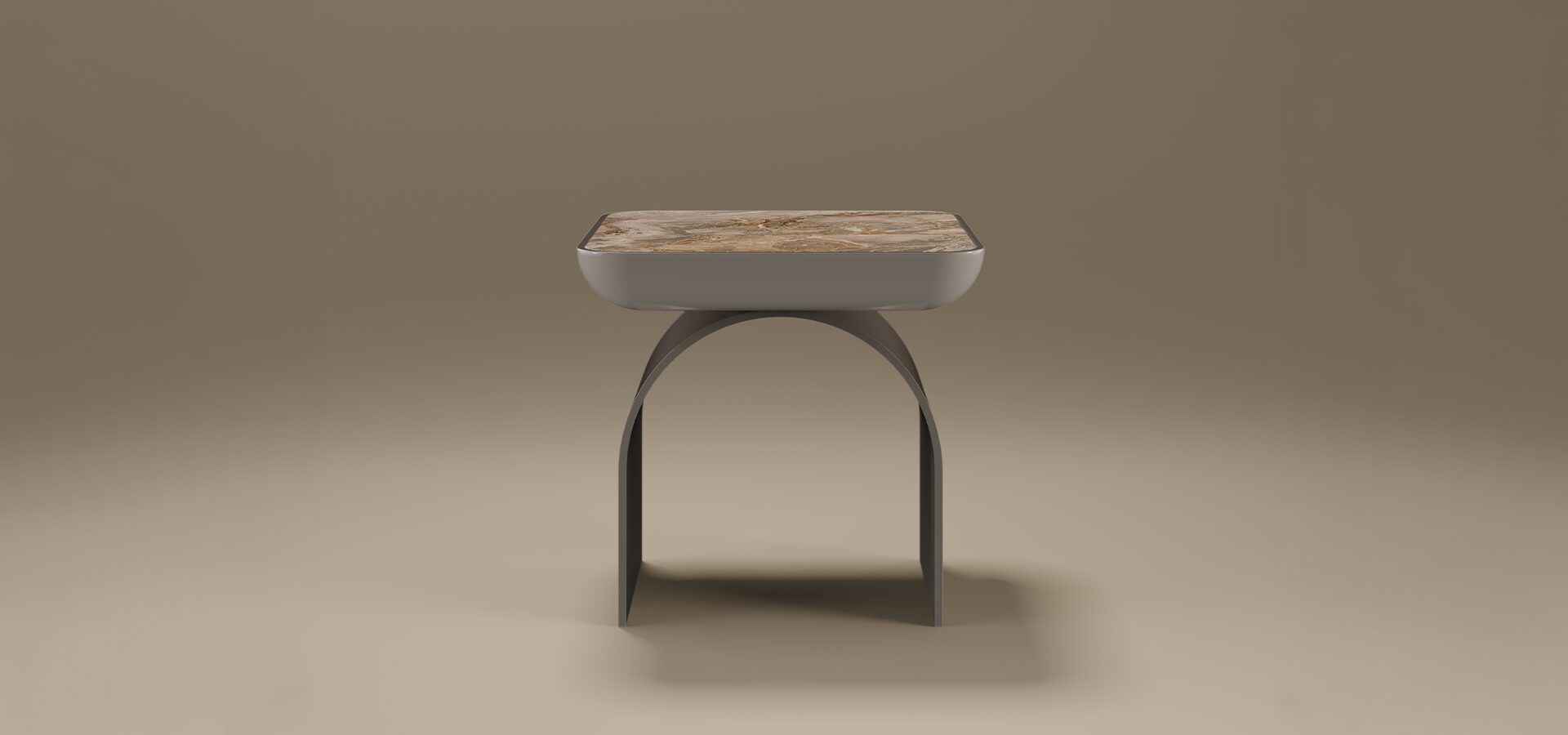 A luxury California Side Table by Porus Studio, featuring a square top with rounded edges made of polished beige marble. The tabletop is cradled in a matte grey lacquered body, which is supported by a sculptural, arched base. The minimalist design combines soft curves with premium materials, set against a neutral, warm-toned studio background.