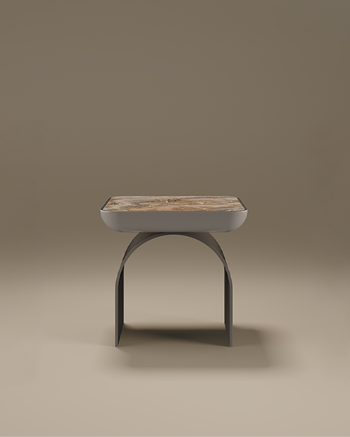 A luxury California Side Table by Porus Studio, featuring a square top with rounded edges made of polished beige marble. The tabletop is cradled in a matte grey lacquered body, which is supported by a sculptural, arched base. The minimalist design combines soft curves with premium materials, set against a neutral, warm-toned studio background.