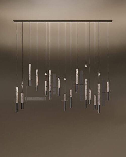 A Portland suspension lamp, featuring an architectural cluster of long, vertical teak wood cylinders with glowing LED light bases. The cylindrical elements, resembling chimes, are suspended from a clean, dark metal horizontal bar by thin black cables, creating a dynamic, rhythmic installation against a warm, neutral backdrop.