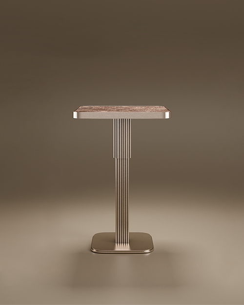 Staten Bar Table by Porus Studio featuring a square marble top and a distinctive fluted central pedestal made of stainless steel set against a neutral brown studio background.