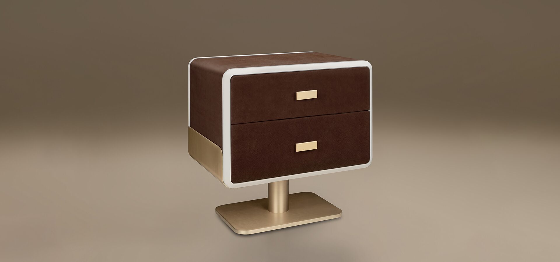 A luxury Phoenix Bedside Table by Porus Studio, featuring a retro-inspired, rounded rectangular body upholstered in dark brown leather. The face of the two drawers is framed by a lacquered trim that provides a sharp metallic contrast. The unit is supported by a central pedestal base with minimalist horizontal handles, both finished in brushed brass. The design blends Space Age aesthetics with premium materials, set against a neutral, warm studio background.
