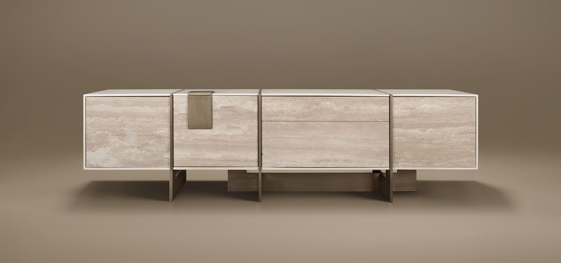 Front view of the Coloma TV Unit by Porus Studio, featuring a textured beige travertine body with elegant bronze metal accents and a geometric base.