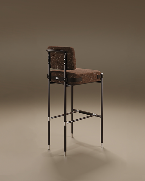 Modern industrial Fulton Bar Chair, featuring Stainless Steel legs. The seat and rectangular backrest are upholstered in a rich brown textured fabric with an intricate abstract pattern of thin white geometric lines. Small rivet details secure the frame to the upholstery. Set against a smooth taupe background.