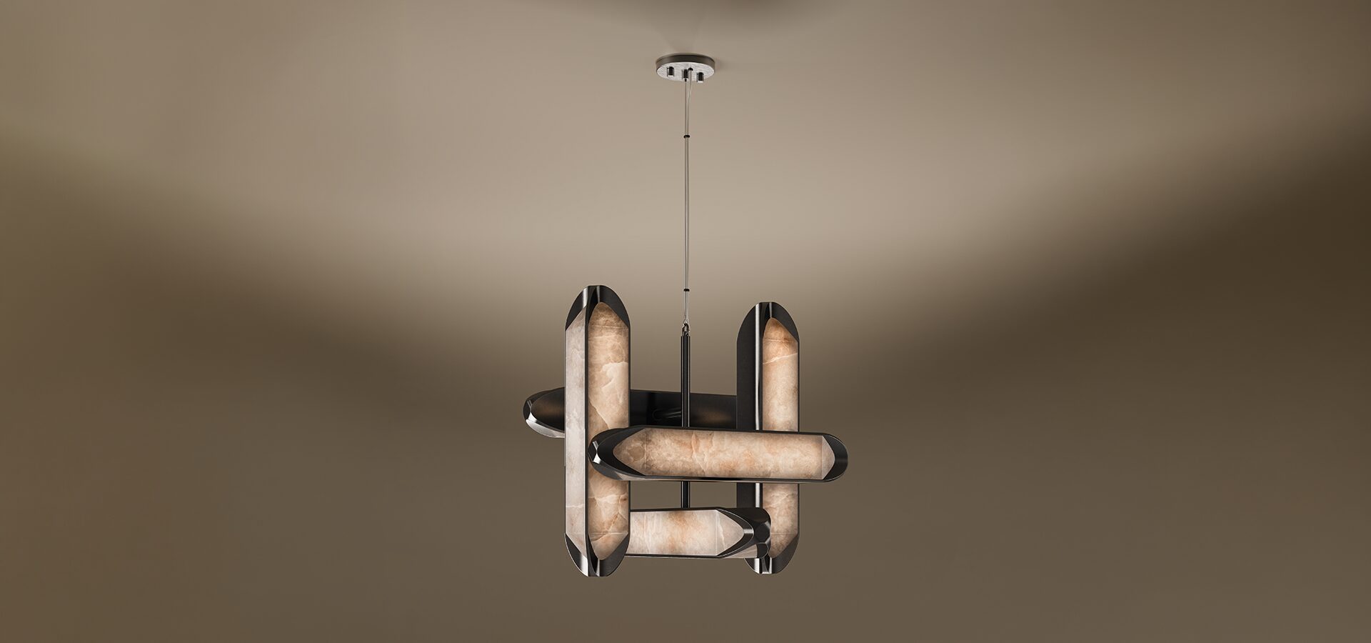 Glacier Suspension Lamp by Porus Studio, featuring an intersecting cluster of four geometric, faceted columns suspended from a central chrome rod. The lamp columns, resembling ice blocks, are crafted from backlit polished alabaster stone, emitting a warm glow from within. Each column is framed by sleek, highly polished metallic accents, creating a modern, luxurious chandelier against a dark, warm gradient background.