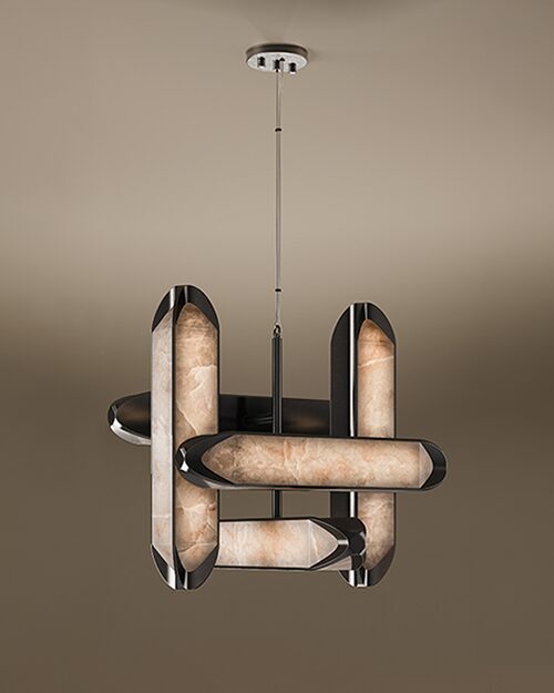 O Gemini disse A Glacier Suspension Lamp by Porus Studio, featuring an intersecting cluster of four geometric, faceted columns suspended from a central chrome rod. The lamp columns, resembling ice blocks, are crafted from backlit polished alabaster stone, emitting a warm glow from within. Each column is framed by sleek, highly polished metallic accents, creating a modern, luxurious chandelier against a dark, warm gradient background.