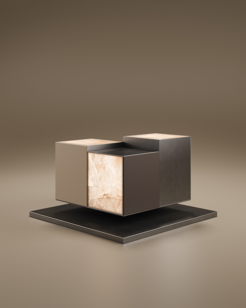 A luxury Hudson Side Table by Porus Studio, featuring an architectural design of three staggered, "floating" cubes. One cube is made of translucent white alabaster, while the others are finished in dark matte lacquer and metal. The piece is set against a neutral, warm-toned studio background.