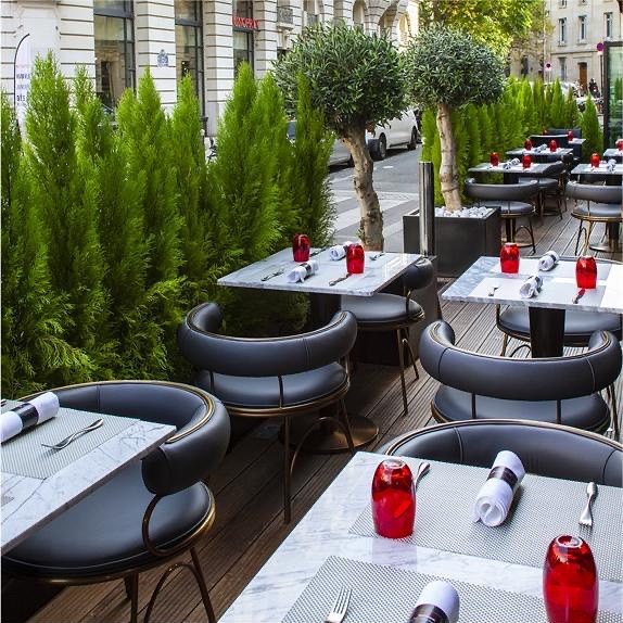 Porus Studio's Austin Dining Chair and Atlanta Dining Table at the Atelier Robuchon Restaurant in Paris, France