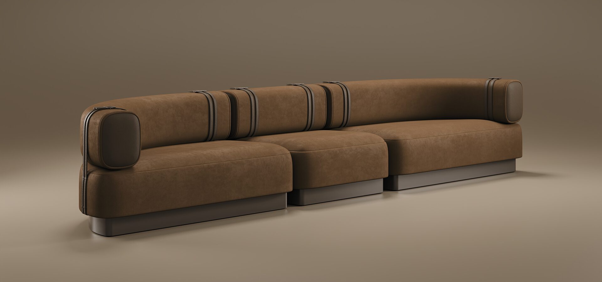 A luxury Sedonna Sofa featuring a curved, modular silhouette upholstered in an earthy terracotta-toned suede. The design is characterized by rounded cushions and a low-profile backrest, accented with vertical dark metal bands that wrap around the frame. The sofa sits on a recessed, dark metallic plinth base, creating a subtle floating effect. Set against a warm, monochromatic taupe studio background.