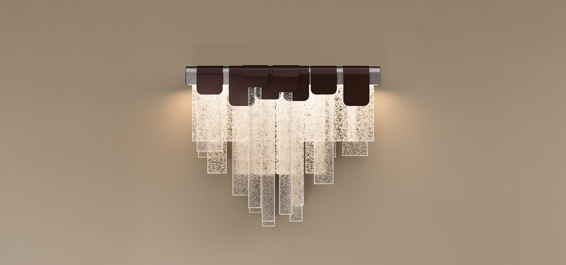Inspired by Yosemite’s winter landscapes, the Frostlight Wall Lamp by Porus Studio transforms light through handcrafted glass to evoke the sparkle of ice and frost.
