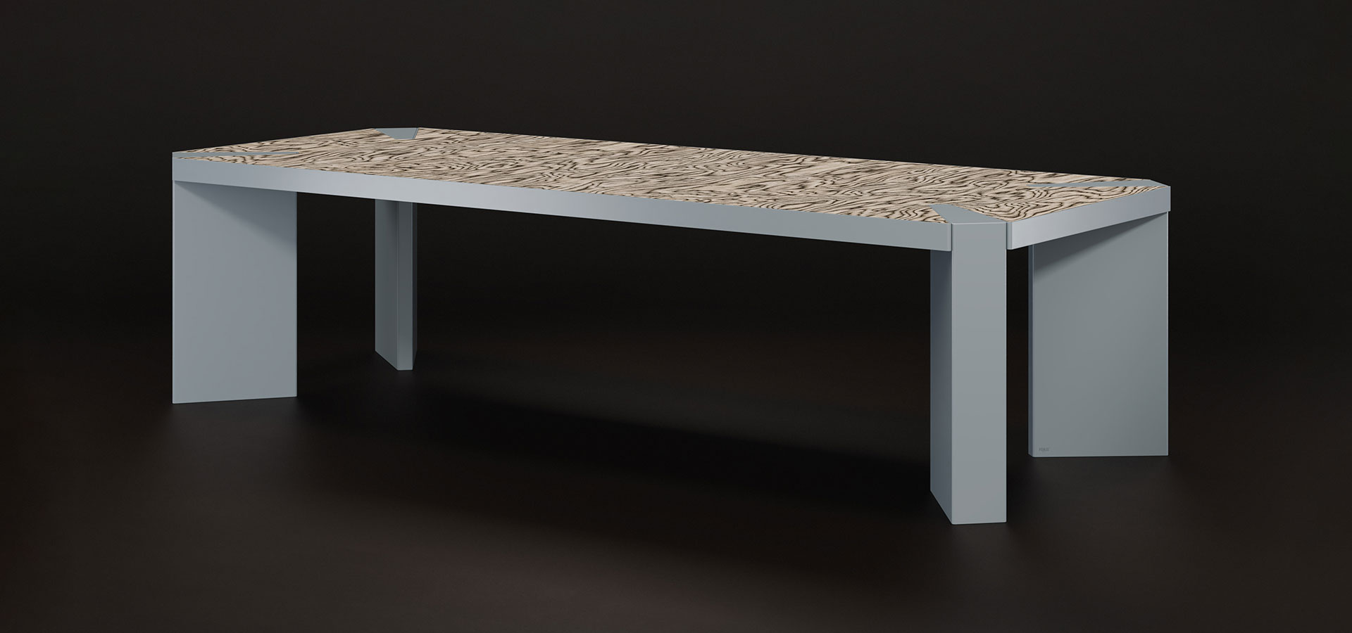 Vermilion Dining Table Vermilion dining table at a 45-degree angle on a dark background, in grey blue lacquered stainless steel with ALPI Sottsass Grey multilaminar wood veneer