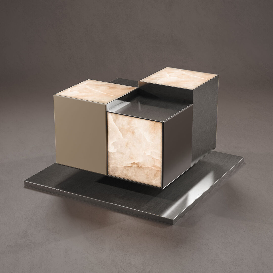 Hudson side table in a brown-toned setting with the lights turned on. The natural alabaster panels softly illuminate, casting a warm, atmospheric glow that highlights the stone’s translucent beauty.