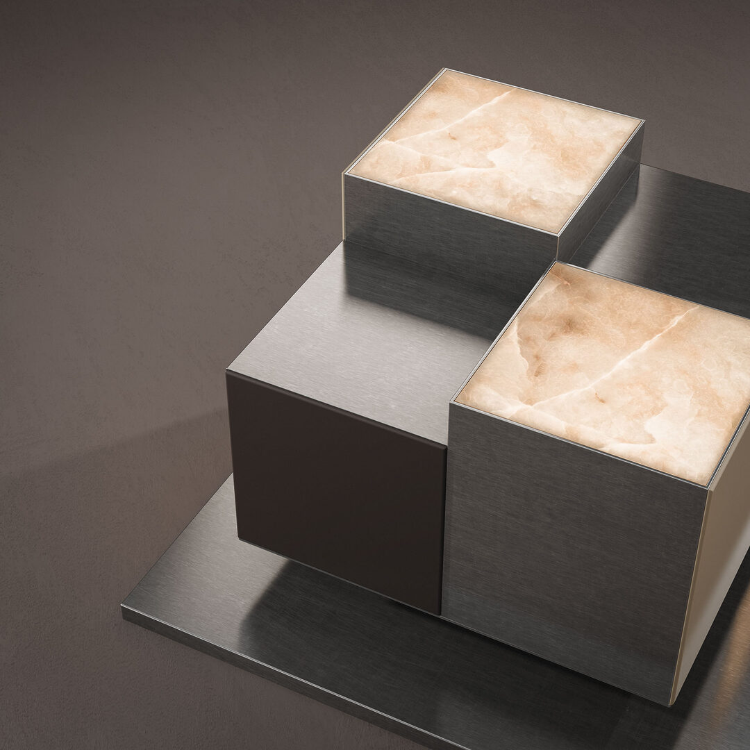 Hudson side table close-up. The natural alabaster panels softly illuminate, casting a warm, atmospheric glow that highlights the stone’s translucent beauty.
